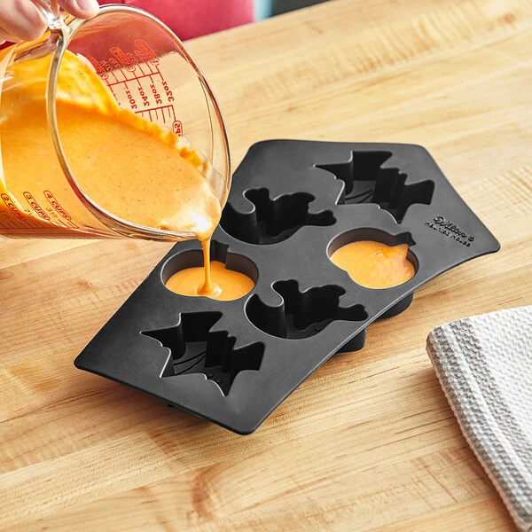 Wilton 12 1/2 inch x 6 7/8 inch x 1 1/2 inch 6-Compartment Assorted Halloween Silicone Baking Mold 191010248