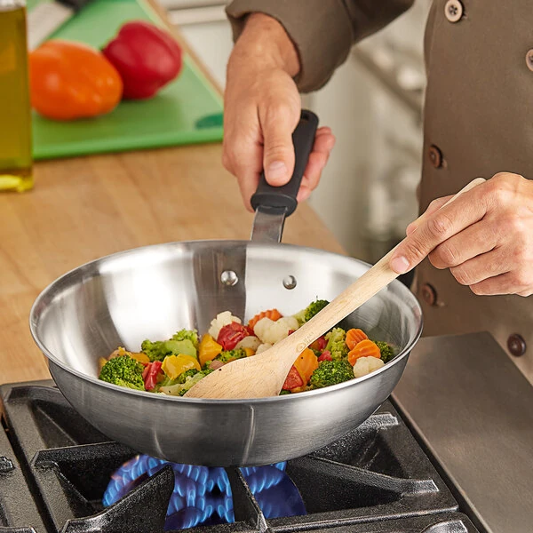 Vollrath Tribute 11" Heavy-Duty Tri-Ply Stainless Steel Stir Fry Pan with Black Silicone Handle 702111
