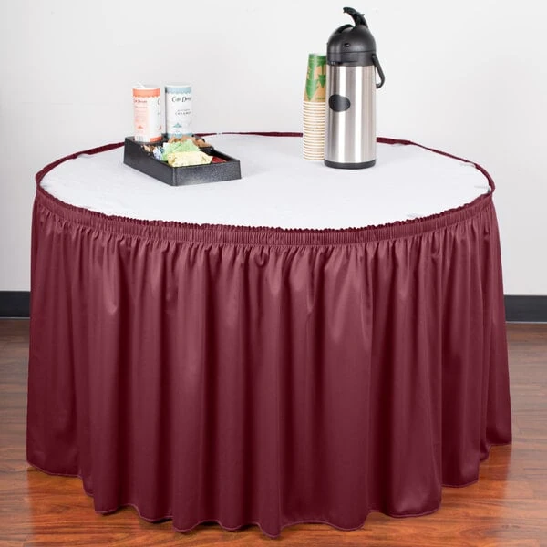 Snap Drape 5412CE29S3-046 Wyndham 13' x 29" Burgundy Shirred Pleat Table Skirt with Velcro® Clips