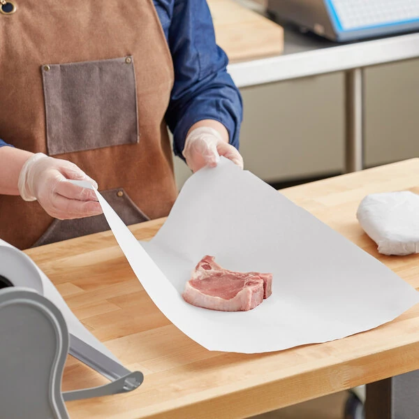 Choice 24'' x 700' 40 lb. White Butcher Paper Roll