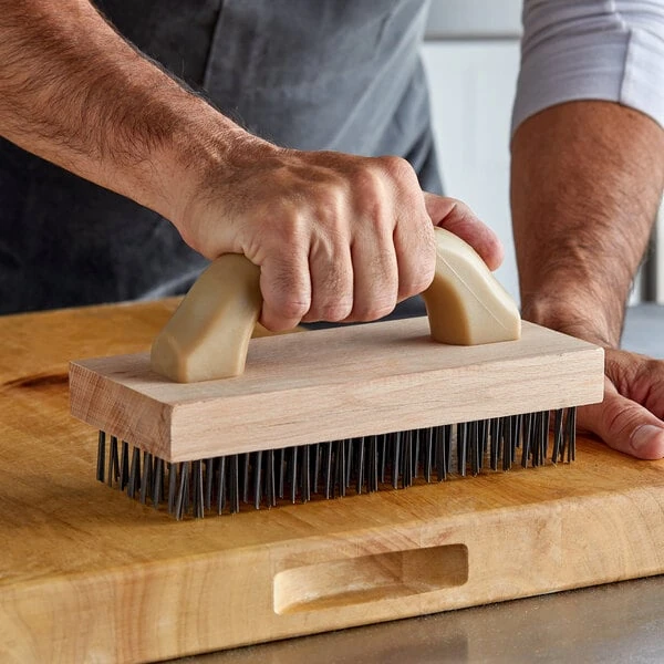 Carlisle 4067600 9 3/8" x 3 3/4" Wooden Butcher Block Brush with Steel Bristles and Handle