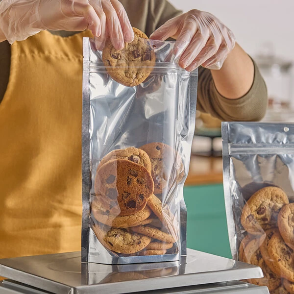 Choice 7 1/2" x 11 1/2" 3 Mil Silver Metallized / Clear Plastic Zip Top Stand-Up Pouch with Hanging Hole - 500/Case