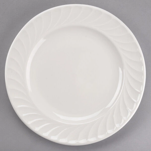 Tuxton MEA-104 Meridian 10 1/2" Eggshell Embossed Swirl Rim China Plate - 12/Case