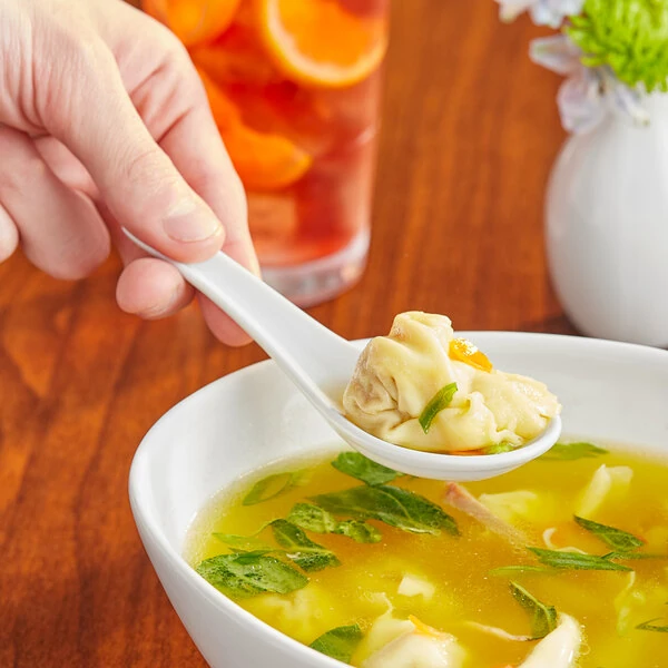 Acopa 0.6 oz. Bright White Porcelain Chinese Soup Spoon / Asian Wonton Soup Spoon - 12/Pack