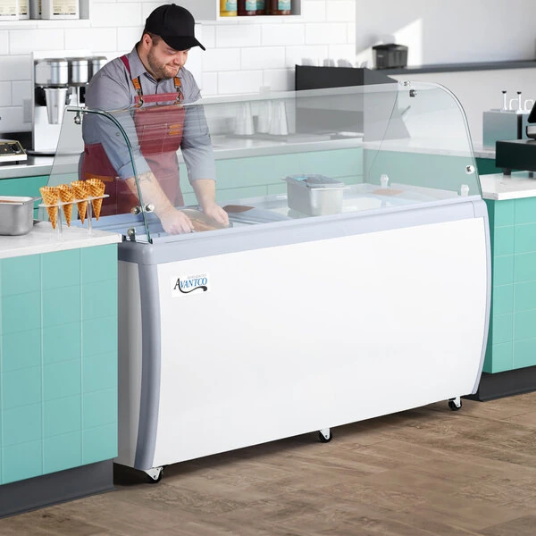 Avantco ADC-GEL-13C 71" Customizable 13 Pan Gelato Dipping Cabinet with Curved Sneeze Guard and Pans