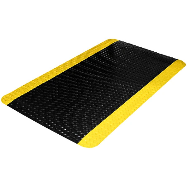 Durable Diamond Dek Sponge 2' x 3' Black Anti-Fatigue Mat with Yellow Borders 442S23BKY - 9/16" Thick